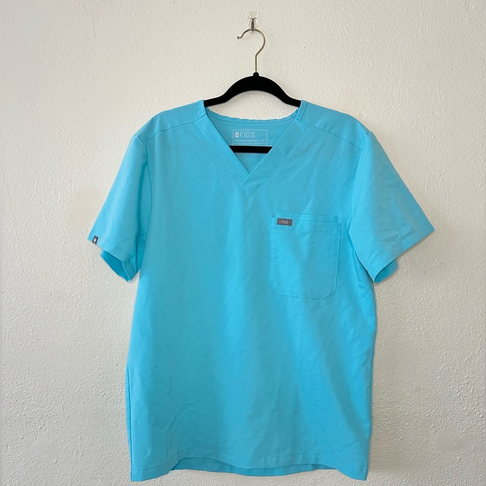 FIGS Men’s Scrubs in Neon Blue. (Tansen Joggers in L and Leon Scrub Top in M)